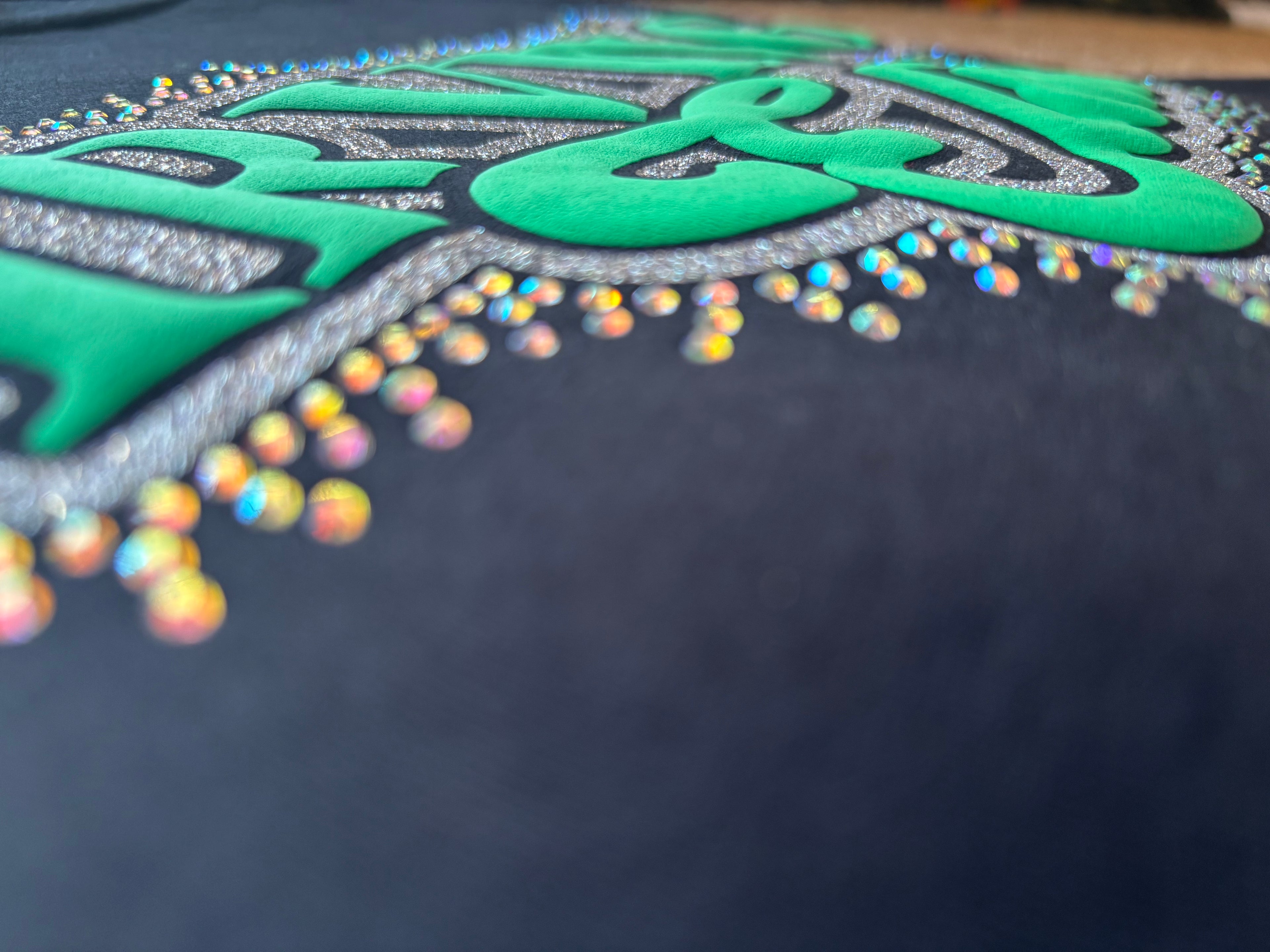 Irving elite puff glitter and rhinestone logo